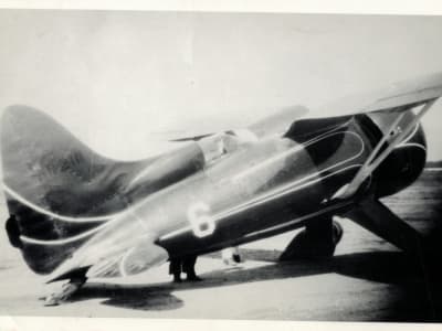 Hall Bulldog at Cleveland, OH with unknown people, left rear view.